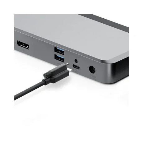 A close-up of an ALOGIC MX2 DUPRMX2 USB-C Dual Display Docks side shows HDMI, USB, USB-C, and audio ports with a USB-C cable about to connect. Ideal for linking 4K UHD displays; adapter included. Certified Refurbished.