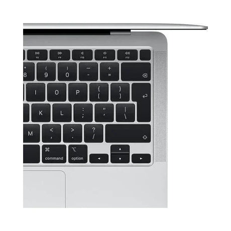 A close-up of the top-right corner of an Apple MacBook Air 2018 A1932 keyboard shows black keys with white letters, part of the trackpad, and a section of the slim silver body and speaker grille.