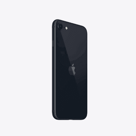 A refurbished Apple iPhone SE 2022 3rd Gen 64GB Midnight Smartphone (LOCKED) by Apple stands upright at a slight angle, showing its back with the Apple logo and single rear camera against a plain light gray background.