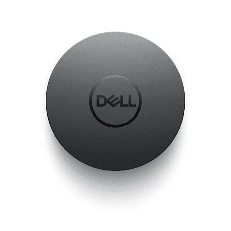 A round, black refurbished Dell DA300 USB-C Portable Docking Station by Dell rests on a white background. The centered Dell logo highlights its smooth, matte finish and compact design, ideal for portable HDMI, VGA, and DP connectivity.