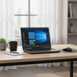 A Dell Precision 7520 i7 7820HQ 15.6" mobile workstation with Windows 11 Pro sits on a wooden desk beside a black mug, notepad, pen, mouse, and potted plant, with a window with sheer curtains in the background.