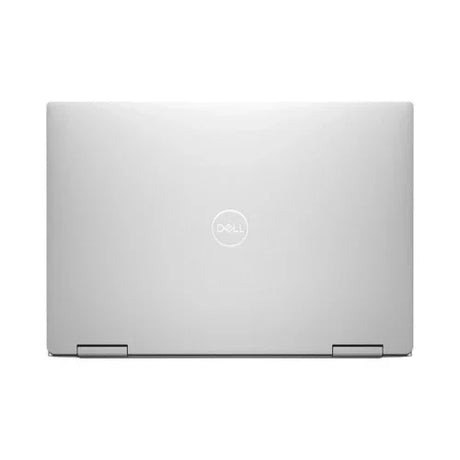 A closed Dell Refurbished XPS 9310 2-in-1 i7 laptop is shown from above, featuring a centered Dell logo on the lid and two hinges at the bottom.