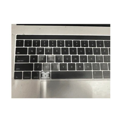 An Apple MacBook Pro Mid 2017 A1707 (15.4", i7 7700HQ, 16GB RAM, 512GB SSD) with a missing keyboard key that reveals the switch underneath; surrounding keys and trackpad are visible. Brand: Apple.