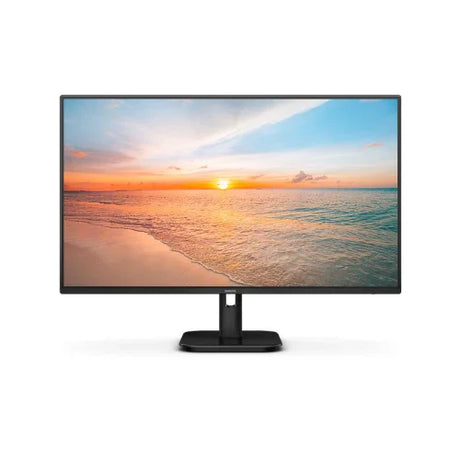 A Philips 27E1N1100D 27" IPS monitor (1920x1080, 8ms, 16:9, VGA HDMI DVI, no stand) displays a scenic beach sunset with a clear sky, calm waves, and the sun near the horizon, framed in slim black bezels.