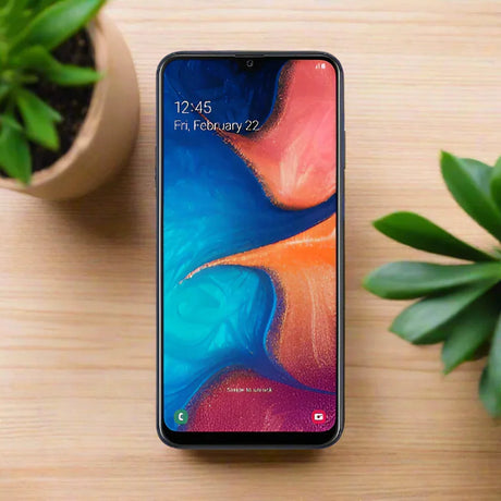 A refurbished Samsung Galaxy A20 SM-A205YN 32GB in Blue displays a vivid abstract wallpaper, showing 12:45 and Friday, February 22, with thin bezels and a small top notch. This unlocked smartphone is by Samsung.