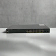 A refurbished Cisco WS-C2960X-24TD-L 24-port Gigabit switch with 2 x 10G SFP+ ports is displayed on a white surface against a plain, light gray background.