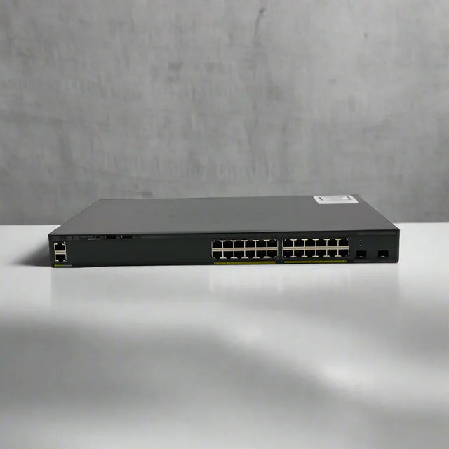 A refurbished Cisco WS-C2960X-24TD-L 24-port Gigabit switch with 2 x 10G SFP+ ports is displayed on a white surface against a plain, light gray background.