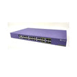 A purple Extreme Networks X440-G2-24P-10GE4 PoE+ 24-Port Managed Switch by Extreme Networks, labeled 450-24T, is displayed against a white background with multiple front-facing Ethernet ports.