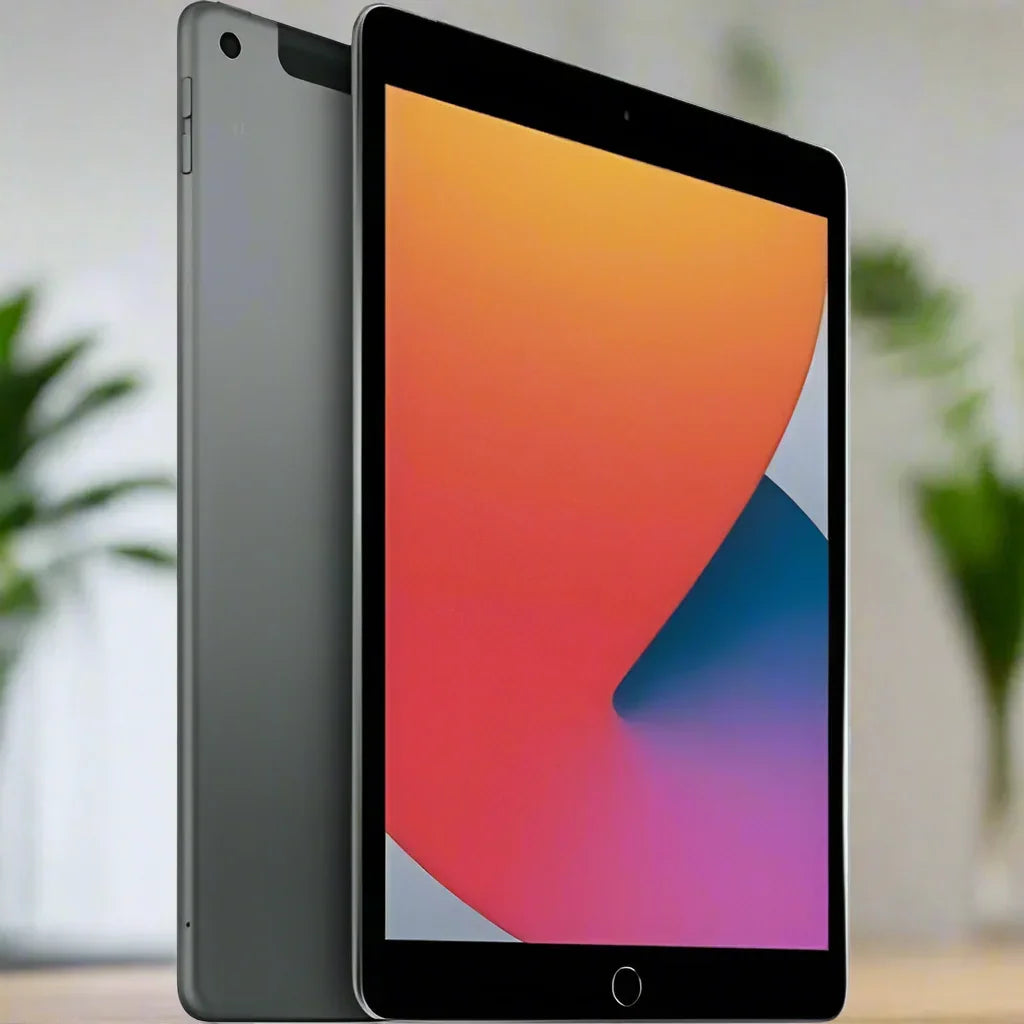 An Apple iPad 8th Gen 10.2" 128GB Space Grey WIFI stands upright, displaying its vivid screen, in front of another showing the back. Both are Apple devices with blurred green plants in the background.