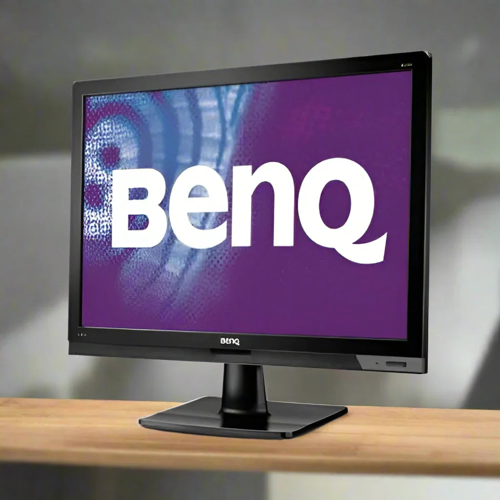 The BenQ BL2201 22 16:10 1680x1050 LCD Monitor with DVI and VGA sits on wood, screen glowing purple with the white BenQ logo. This Certified Refurbished monitor stands out against a softly blurred background.