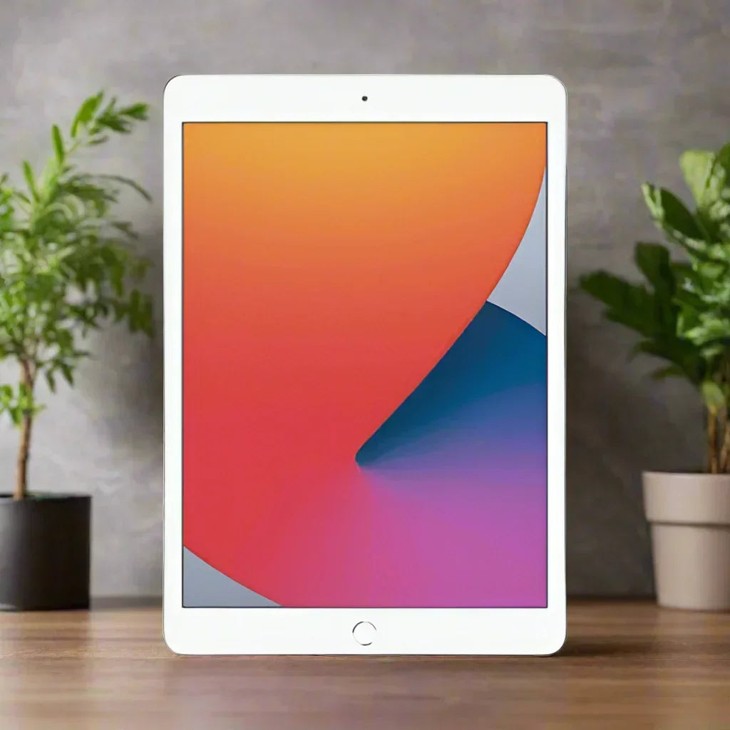Silver Apple iPad 8th Gen with a 10.2-inch display, front-facing camera, and a colorful screen.