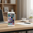 An unlocked Apple iPhone 6 32GB Gold displays the home screen with app icons like Messages, Calendar, Photos, and Camera. This certified refurbished smartphone by Apple comes in gold with warranty.