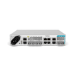 The ADVA FSP 150-GE104 Carrier Ethernet Demarcation Device by ADVA is a white unit featuring multiple Ethernet and SFP ports, a power socket, and rear cooling vents.