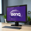 A certified refurbished black BenQ BL2211 22 16:10 LCD monitor (1680x1050, DVI, VGA, 5ms) with no stand displays a purple screen and BenQ logo on a stylized oval background against a white backdrop.