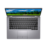 A silver Dell Latitude 5310 2-in-1 (i7, 16GB RAM, 256GB SSD, 13.3") is viewed from above with its screen open to a scenic mountain landscape, showing the keyboard and touchpad clearly visible.