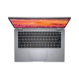 A silver Dell Latitude 5421 i7 11850H 2.5GHz 16GB 512GB laptop is shown from above with its screen open to an orange-pink abstract pattern. The keyboard and touchpad are visible—ideal for professionals needing reliable Dell performance.