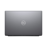 A closed Dell Latitude 5520 i7 laptop in silver is shown from above, featuring the Dell logo centered on the lid against a plain white background.