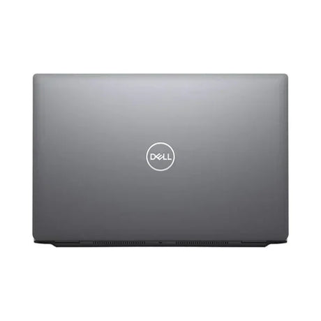 A closed Dell Latitude 5520 i7 laptop in silver is shown from above, featuring the Dell logo centered on the lid against a plain white background.