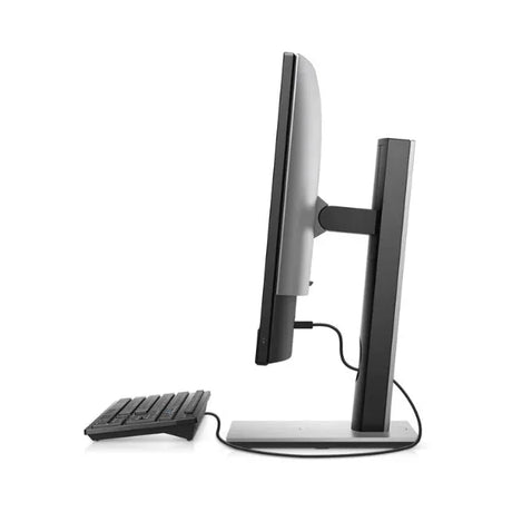 A side view of a Dell Optiplex 7400 AIO i5 desktop with a 23.8 monitor on a stand and a wired keyboard, all set against a plain white background.