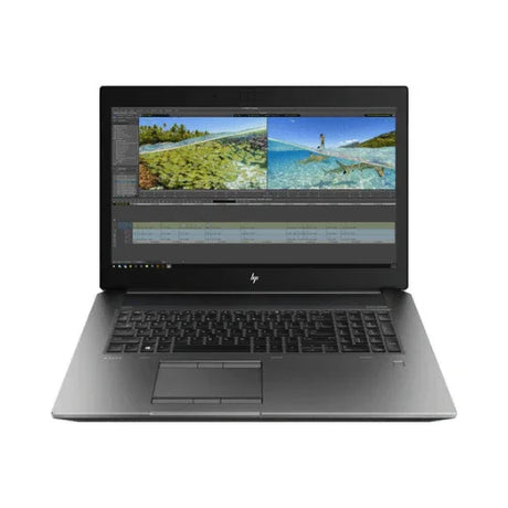 A black HP ZBook 17 G6 (E-2186M, 64GB RAM, 1TB SSD, P5200) laptop with a 17.3" UHD display shows photo/video editing of tropical scenery; keyboard and touchpad visible against a white background.