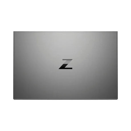 A closed silver HP ZBook Studio G8 with a centered black Z logo rests against a white background. Certified refurbished, it features an i9-11950H, 32GB RAM, 1TB SSD, RTX A2000, and Windows 11 Pro.