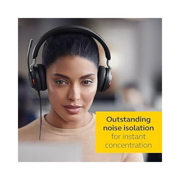 A woman wearing a Jabra Evolve2 40 Stereo Wired Headset USB-C focuses on a screen in an office. A yellow box displays the message: “Outstanding noise isolation for instant concentration.”.