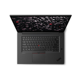 Top view of a refurbished Lenovo ThinkPad P1 G3 W-10855M, 15.6" UHD Touch screen open to a dark abstract background; visible keyboard and signature red TrackPoint. 32GB RAM, 512GB SSD, T2000, Windows 11 Pro.