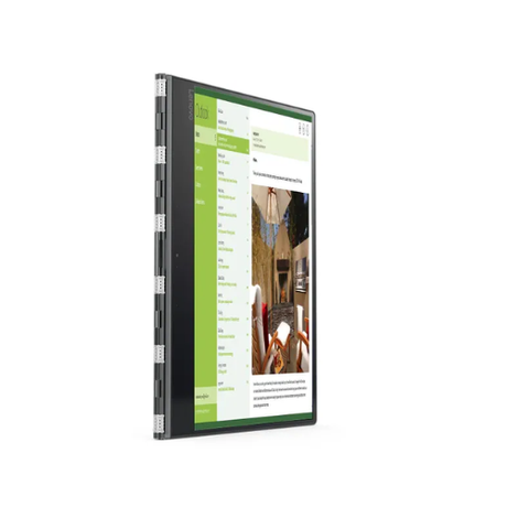 A slim Lenovo Yoga 910-13IKB with a 14" 4K UHD display stands upright at an angle, displaying a webpage with a green sidebar and a room image on its screen, set against a plain white background.