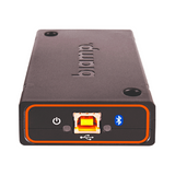 The Biamp TESIRA EX-UBT 8-Channel AVB USB Audio Expander is a black, rectangular device with biamp embossed on top, featuring a front USB-B port, power button, and Bluetooth indicator.