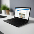 A Lenovo ThinkPad T15 G2 (i7 1165G7, 16GB RAM, 512GB SSD, 14" Touch) business laptop is open at an angle, displaying a work email on its screen against a white background.