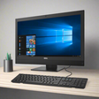 A Dell Optiplex 7450 AIO i5 7600 3.5GHz with 8GB RAM, 256GB SSD, and a 23" display runs Windows 10 Pro. It sits on a light wood desk with a black keyboard and wired mouse, ideal for updating your workspace.