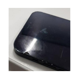 A close-up of a refurbished Apple iPhone 12 256GB Black Unlocked Smartphone (AU STOCK) with an LCD crack, showing visible corner and screen damage.