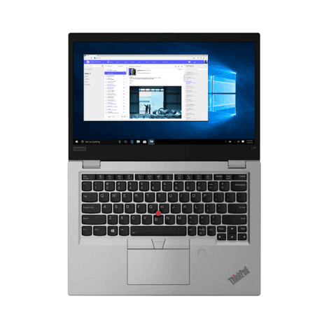 A gray Lenovo ThinkPad L13 Yoga G2 (i5 1135G7, 16GB RAM, 256GB SSD, 13.3 Touch) is shown from above with its keyboard and touchpad visible; the screen displays Windows and a web browser.