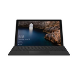 A Microsoft Surface Pro 4 (12 touchscreen, Intel Core i5, 8GB RAM, 256GB SSD) displays a scenic rocky arch over water with the time 6:18 and date Saturday, June 18 in the lower left.